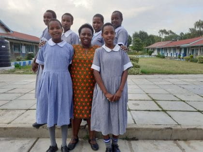 Dr. Jane Ngobia (centre) in Kenya with students