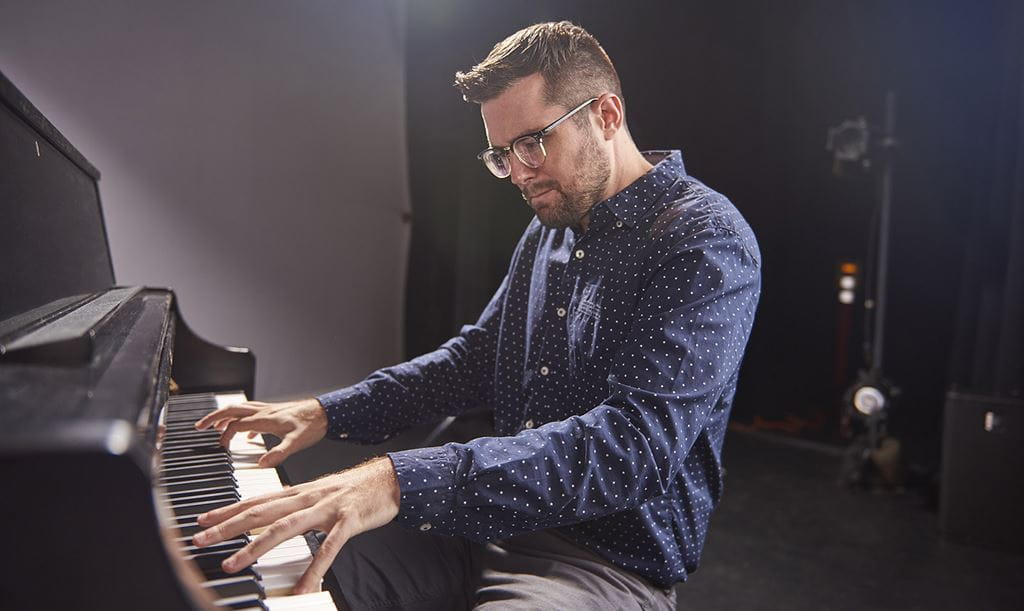 Daniel Abrahamson playing a piano