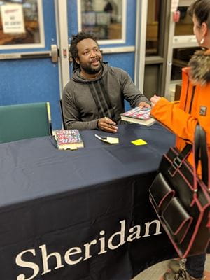 Marlon James signing books at Sheridan Reads 2019