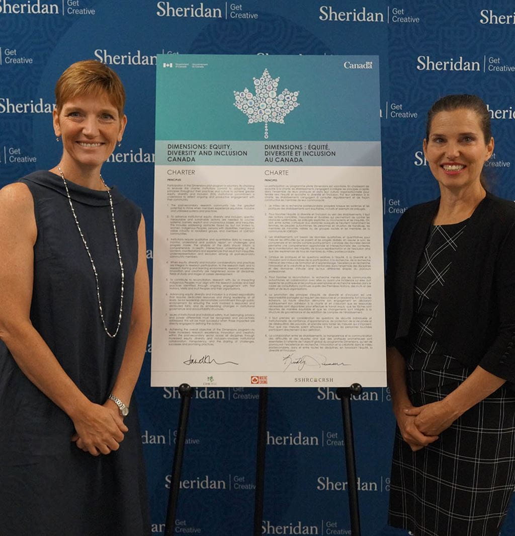 Janet Morrison and Minister Duncan with the Dimensions Charter