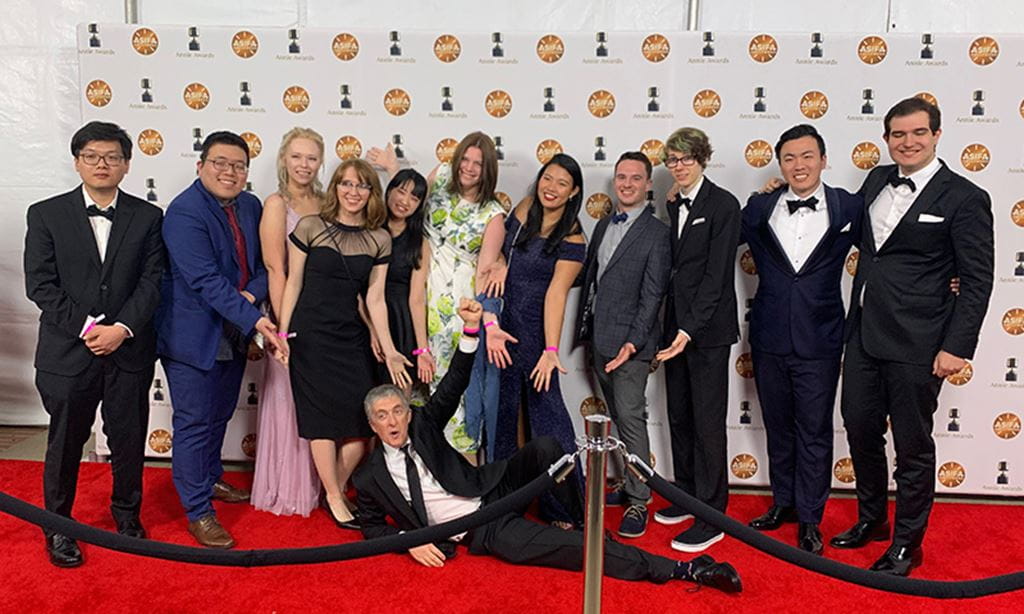 Students and professor Steven Barnes on the red carpet at the Annie Awards in LA