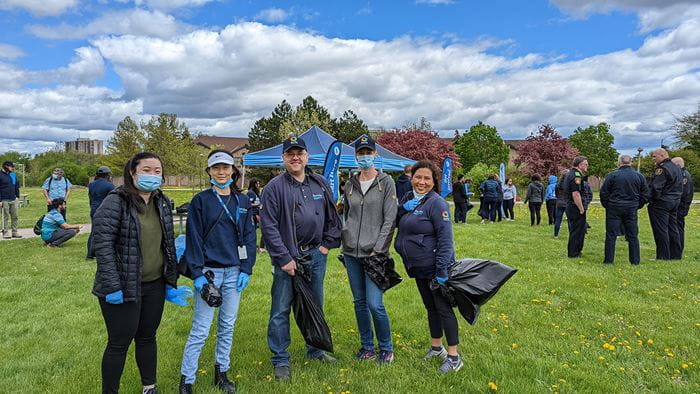 Small group of park cleanup volunteers