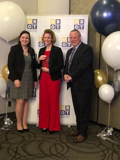 Dr. Janet Morrison, President and Vice Chancellor of Sheridan, poses with the MBOT Award for Employer of the year. Amy Delisle, Vice Chair of the Board of Directors at MBOT stands to her left, while Trevor McPherson, President and CEO of MBOT, stands to her right. 