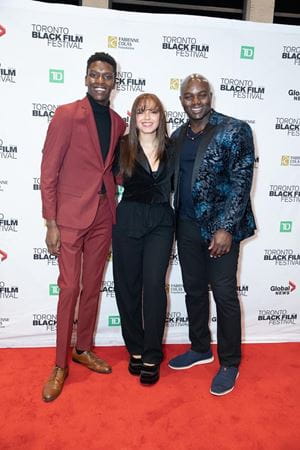 Riel Flack is pictured at the Toronto Black Film Festival with fellow Sheridan ATVF graduate Tope Babolola and former CFL player Orlando Bowen.